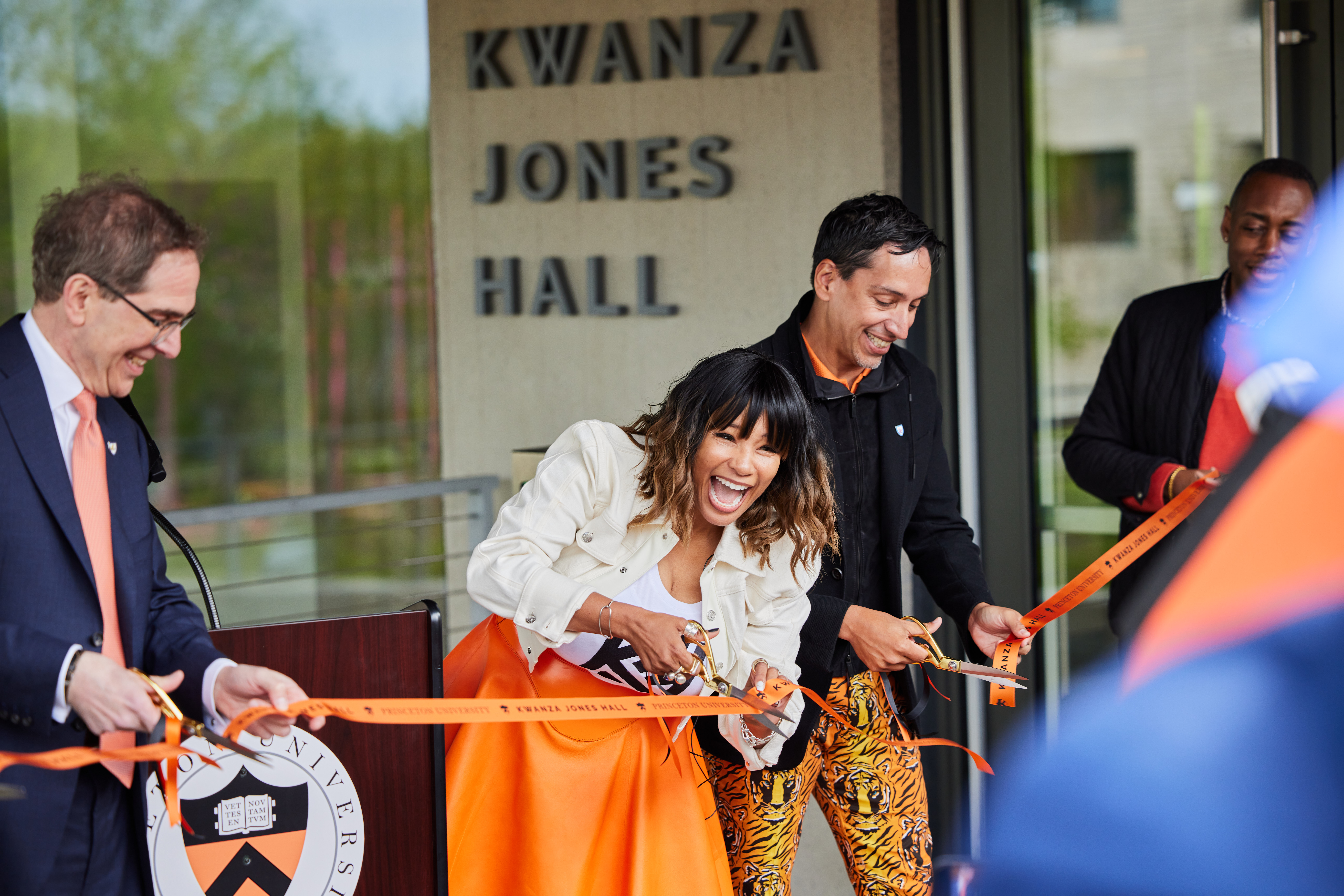 From left, President Christopher Eisgruber ’83, Kwanza Jones ’93, and José E. Feliciano ’94 at the 2023 ribbon-cutting for the dorms that bear the latter two’s names.Courtesy of Kwanza Jones ’93 and José E. Feliciano ’94
